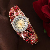 Montre bracelet fleur et diamant