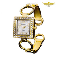 Montre bracelet quartz femme or anneaux