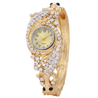 Montre bracelet strass or
